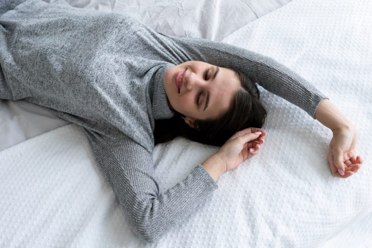 a girl sleeping on her Sleep Surface