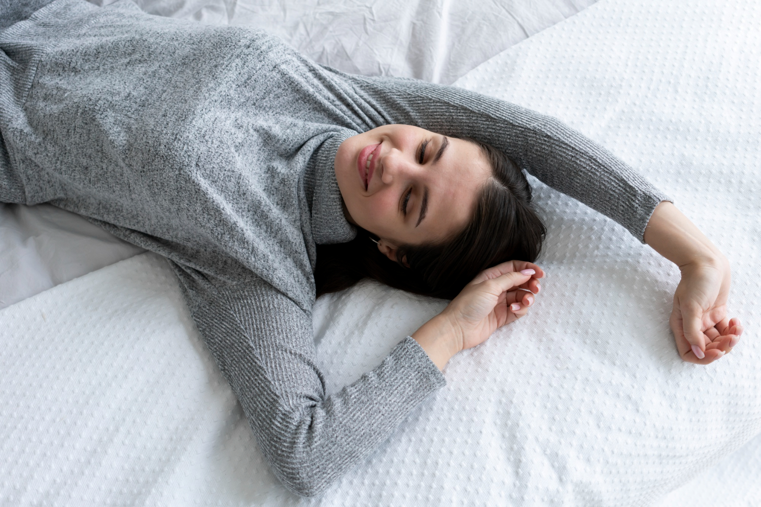 a girl sleeping on her Sleep Surface