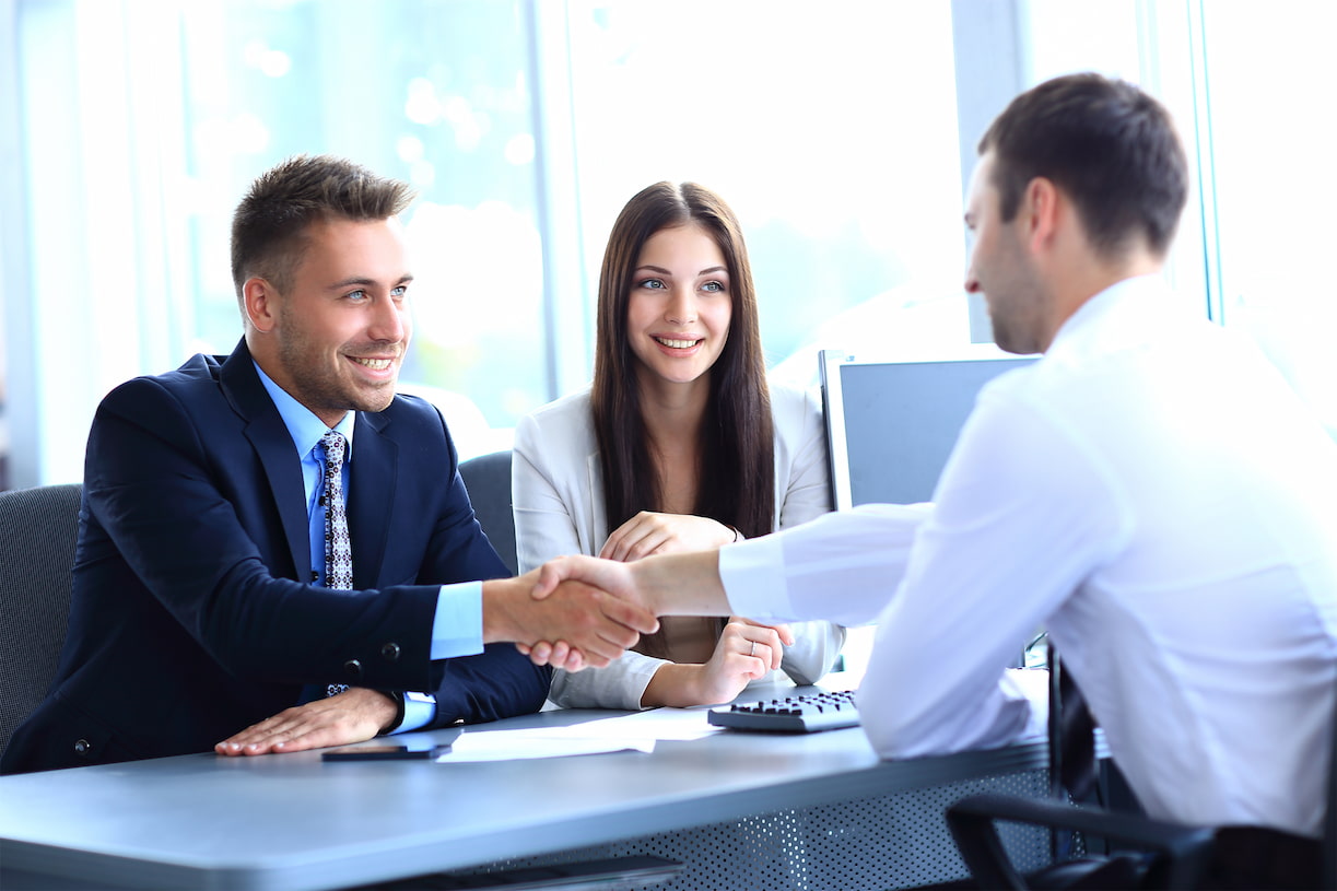 Immigration Lawyer shaking hands